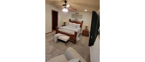 Master bedroom with queen bed and master bath attached