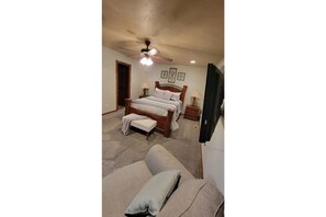Master bedroom with queen bed and master bath attached