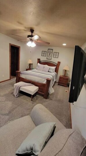 Master bedroom with queen bed and master bath attached