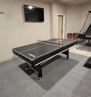 Game room.table,sectional,TV, hot tub, pool table/table tennis, darts, bsktball