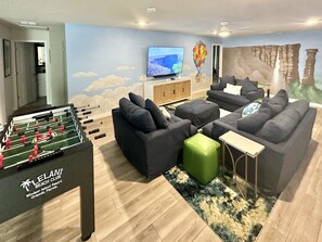 Up! Movie Game Loft with 75" TV, Xbox S, Foosball, and mini Pool/Billiards