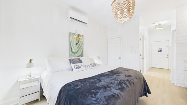 King bed and TV in living area (sleeps 2)