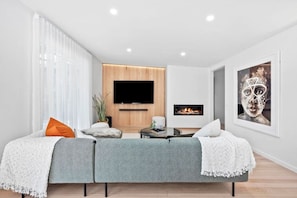 Stylish living space adjoining the kitchen & dining area