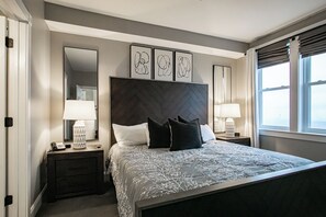 The master bedroom features a king size bed.