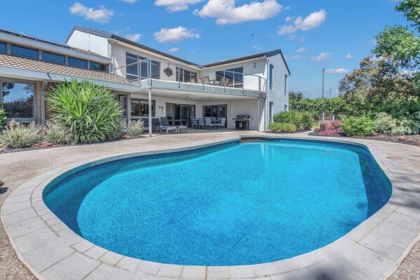 Solar heated swimming pool