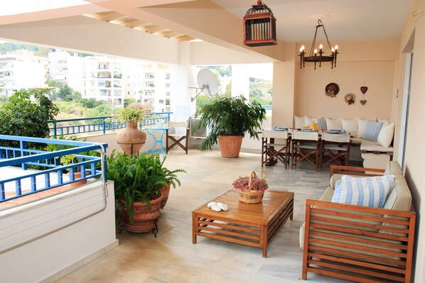 Outdoor Furnished Veranda with city and sea vies