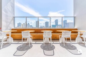 Maybe a bite to eat or remote work here with a city view