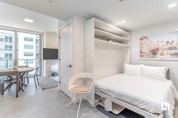 The other queen bed is a Murphy bed too!