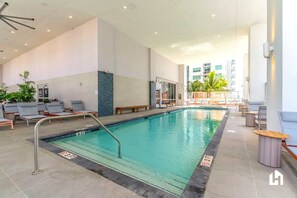 The pool is heated with loungers to relax