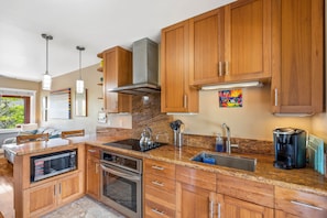 A fully stocked kitchen is provided for dining in