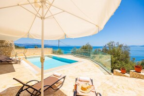 Private pool and terrace with panoramic sea views
