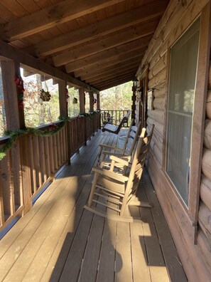 Relax in the rocking chairs or sway in the porch swing with the amazing view