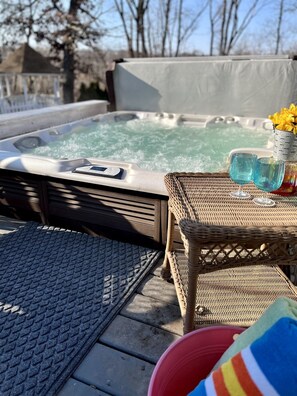 The hot tub is built down into the deck so the entrance is very easy.