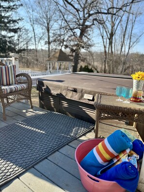 Hot tub on the deck overlooking the fully fenced yard and fire pit. There is no neighbor on this side and we are a dead-end street with minimal through traffic. See the map for layout.