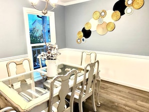 Dining room table.Comfy and convenient, this home is perfectly located in Clarksville TN. Perfect place to stay if you're visiting friends or family, commuting to Nashville or Ft. Campbell or traveling through. 