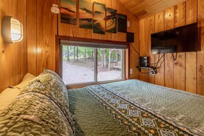 Serenity & Utility: Bedroom offering both storage and an office nook.