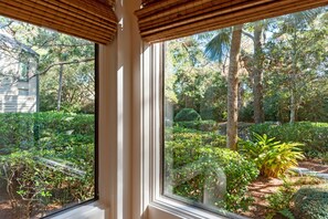 Beautiful lush greenery is just outside your bedroom window