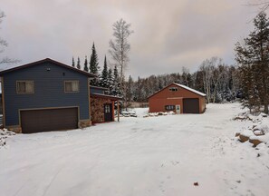 Drive through driveway with tons of parking room and heated attached garage. 
