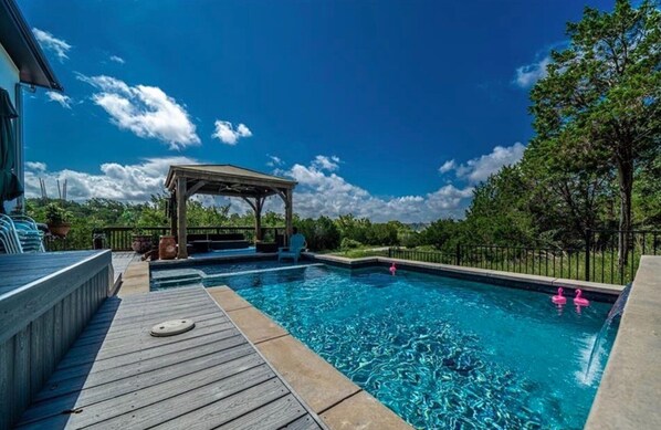 Gorgeous pool with waterfall and shelf to enjoy, relaxing and getting some sun1