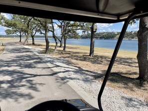 View of the lake from the golf cart! 5 lake parks to choose from!