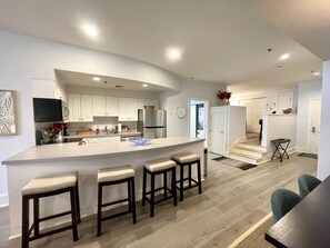 Kitchen to Loft space, and bathroom