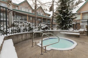 Communal hot tub centrally located in the complex