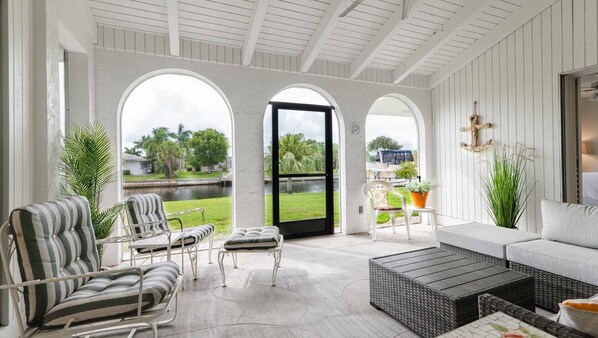 Relaxing lanai with canal views
