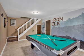 Ready to hit some stripes? The 8' slate pool table is the perfect place to challenge your friends and have some fun. Plus, we've got a bar area, foosball table, dartboard & TV in the lower level – let the good times roll!