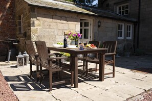 Enjoy an alfresco meal whilst staying at the stunning Eslington East Wing