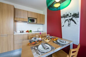 View on dining table and kitchen