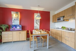 view on dining table and kitchen