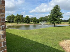 adjacent pond. Large backyard