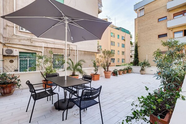 terrace with table and seats