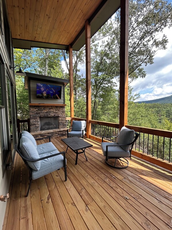 Watersong Ridge Main Deck with sitting area by fireplace
