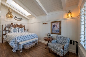 Cozy Queen Bedroom with sitting space.