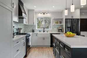 Fully equipped and stocked kitchen. From pots and pans to spices and seasonings, everything you need is at your fingertips.