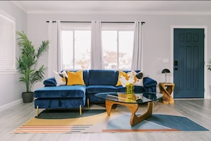 Step into our living room and instantly feel at home. Sink into the plush couches, put your feet up, and kick back and relax.