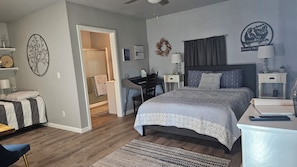 The full bathroom and additional sleeping area.