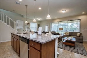 Open space concept with stainless steel appliances