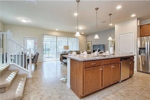 Open space concept with stainless steel appliances