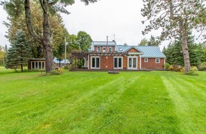 Summertime, rear of Main House from lake