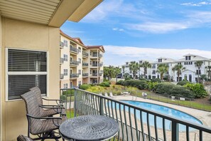 The balcony overlooks the pool and hot tub!