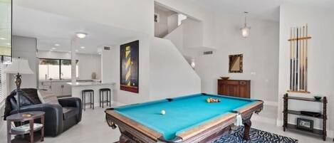 Authentic pool table with 70" Television. 
