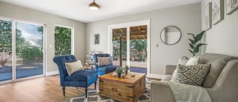 Sitting area right off the kitchen with access to yard and covered patio