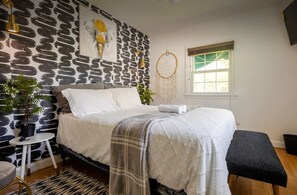 3rd bedroom with queen size bed and flat screen tv