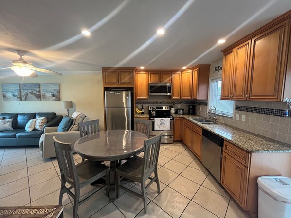 JR59 Kitchen pano with table & lights on, MAIN Page