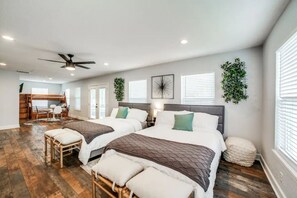 The 3rd bedroom has 2 queen beds, bunk bed, a futon and queen blowup mattress. 