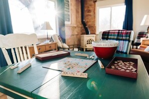 Scrabble, bridge, poker, cards, puzzles, a record player, and a beautiful wood burning stove. Our game room will bring out the kid in everyone! Tall tales, Dad jokes, and memories! 