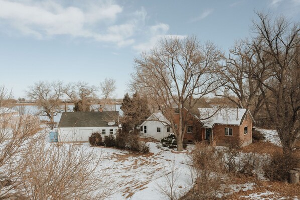 Gorgeous backyard wedding location! Country solitude, 2+ acre estate. 40-acre private lake. 1700 sf vintage farmhouse, 2-car garage, 2-1200sf insulated outbuildings for year round entertainment.