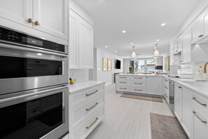 Open kitchen with all new cabinets and countertops